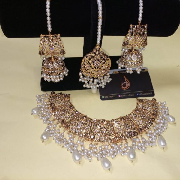 Hand Made Gold Polish Bridel set. Rs. 2500